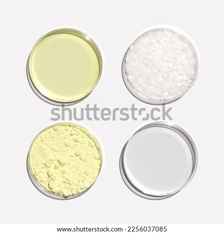 Poly Aluminium chloride liquid, Microcrystalline wax, Alcohol and Sulfur Powder in Petri dish. Chemical ingredient for Cosmetics and Toiletries product. Top View Royalty-Free Stock Photo #2256037085