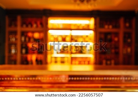 Beautiful view composition with different bar equipment and steel tools which stand on bar counter. Blurred bar background Royalty-Free Stock Photo #2256057507