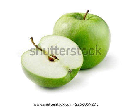 granny smith apple with one halved isolated Royalty-Free Stock Photo #2256059273