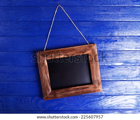 Vintage frame on wooden background