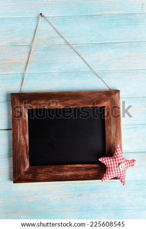 Vintage frame on wooden background