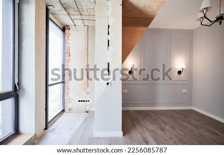 Comparison of apartment room with large panoramic window before and after refurbishment. Old room before restoration and new renovated room with elegant interior design. Royalty-Free Stock Photo #2256085787