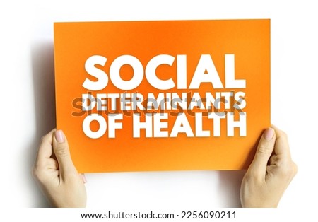 Social determinants of health - economic and social conditions that influence individual and group differences in health status, text on card Royalty-Free Stock Photo #2256090211