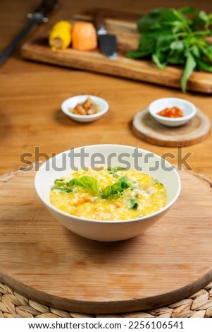 Manado porridge mixed with various kinds of vegetables Royalty-Free Stock Photo #2256106541