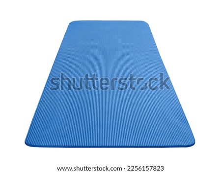 Blue rolled out yoga mat isolated on white background with clipping path Royalty-Free Stock Photo #2256157823