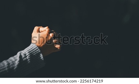 Banner with copy space of woman hands praying to god on nature background. Panorama of female person worship with faith and love. Concept of Religion, Christianity, faith, peace, hope