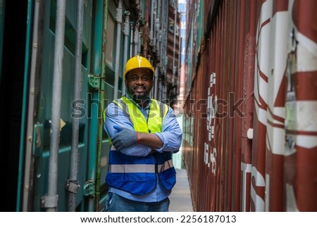 Technician working and inspecting cargo container in shipping yard,Container Shipping Logistics concept.
