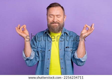 Photo of calm satisfied aged person closed eyes hands fingers meditate isolated on violet color background