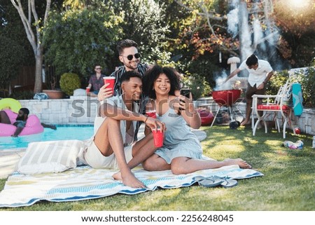 Friends, party and picnic in summer, selfie and fun together for break, relax and smile outdoor, playful or bonding. Young people, men or woman with smartphone, share picture or celebration in garden