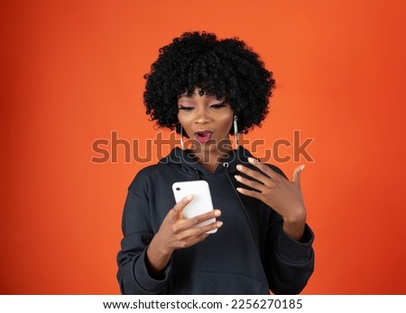 Lady holding a mobile phone