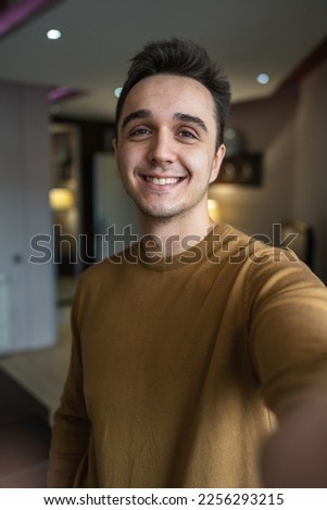 Portrait of man selfie point of view UGC of adult caucasian male happy Royalty-Free Stock Photo #2256293215