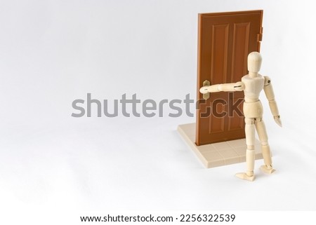 A drawing doll and a door. moving forward image