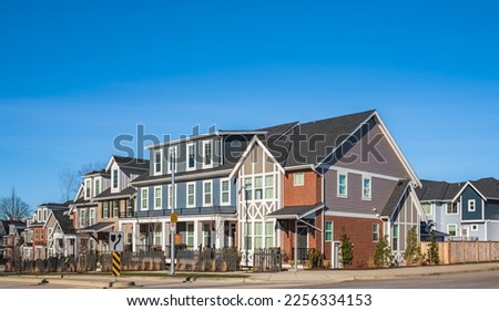Residential townhouses. Modern apartment buildings in BC Canada. Modern complex of apartment buildings. Concept of real estate development, house for sale and housing market. Nobody, street photo