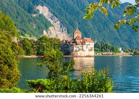 Chillon Castle or Chateau de Chillon is an island castle located on Lake Geneva near Montreux town in Switzerland Royalty-Free Stock Photo #2256364261