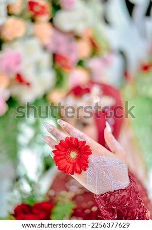Bride's with Red Flowers on Hand