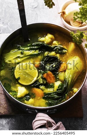 Pak choi in coconut milk soup aerial view
