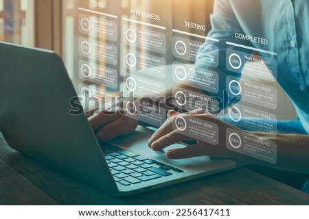 Agile software development and kanban concept with tasks in progress, testing or completed Royalty-Free Stock Photo #2256417411