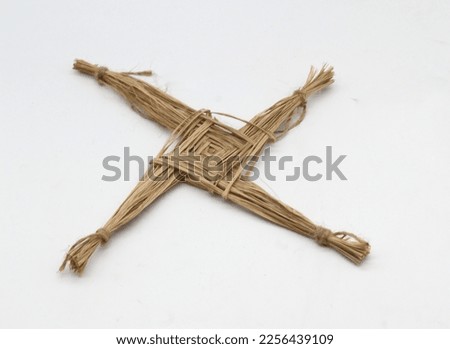 Cross of Saint Brigid, patron saint of Ireland.  Imbolc February 1 and 2 Royalty-Free Stock Photo #2256439109