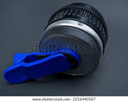 Macro lens for mobile phone isolated on black background