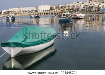 Silence in the small fishing harbor in Malta
