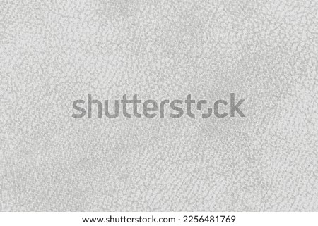 Silver white velvet background or velour flannel texture made of cotton or wool with soft fluffy velvety satin fabric cloth metallic color material