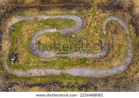 Top drone view of RC car track. High quality photo Royalty-Free Stock Photo #2256488081