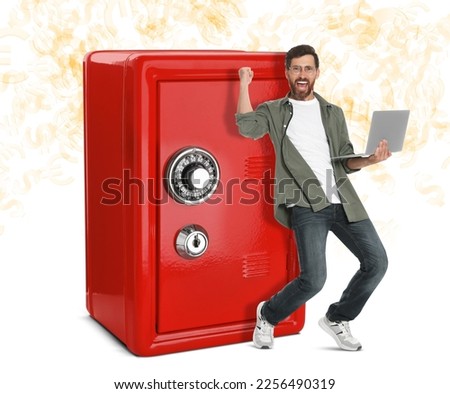 Multiplying wealth, increasing savings. Happy man with laptop near big red safe surrounded by money signs on white background