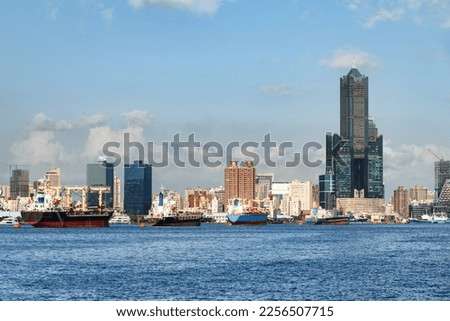 Awesome Kaohsiung skyline, Taiwan. Amazing view of Kaohsiung Harbor, 85 Sky Tower (Tuntex Sky Tower) and other modern buildings of downtown. The skyscraper is a landmark of Taiwan. Scenic cityscape. Royalty-Free Stock Photo #2256507715