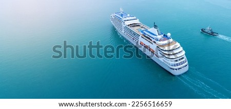 VALENTINE’S DAY CRUISES Cruise Ship, Cruise Liners beautiful white cruise ship above luxury cruise in the ocean sea at early in the morning time concept exclusive tourism travel on holiday. Royalty-Free Stock Photo #2256516659