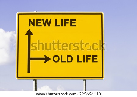 yellow traffic sign with arrows in two directions. One arrow shows the way to new life, the other the way to old life, concept for making a change 