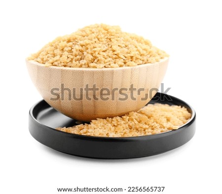 Bowl with raw stelline pasta on white background