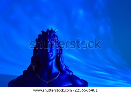 Maha Shivratri, Lord Shiva on blue background. Royalty-Free Stock Photo #2256566401