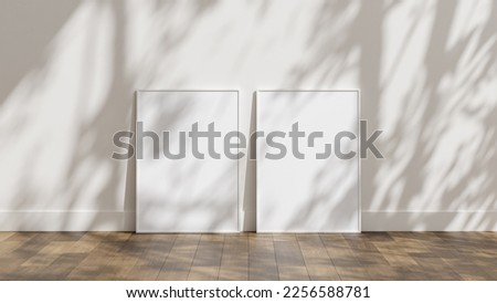 frame poster mockup standing on wooden floor with white wall and sunlight shadow