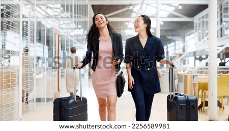 Business woman, phone and walking with luggage in travel for work trip partnership at the workplace. Happy women talking or chatting on a walk to the airport for opportunity or journey with suitcase Royalty-Free Stock Photo #2256589981