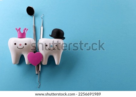 this photo Dental health concept. Dentist day concept. Flat lay, top view, copy space for text.stomatology. Royalty-Free Stock Photo #2256691989