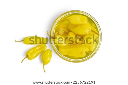 Pickled yellow pepper, pepperoncini or friggitelli in bowl isolated on white background. Hot pepper marinated, brined. Traditional Italian and greek cuisine, ingredient for salad, pasta, sauce. Royalty-Free Stock Photo #2256722191
