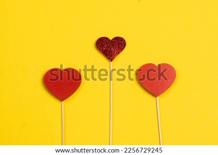 Valentine's Day. Frame of gifts, candles, confetti on a colorful background. Valentine's day background.