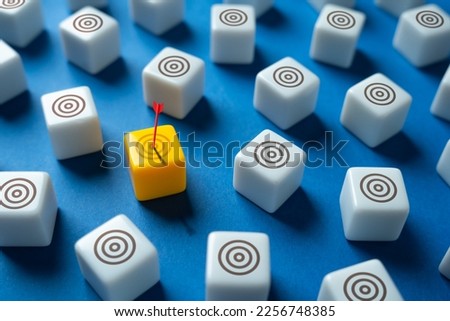 The arrow hit the highlighted yellow target. Advertising, marketing and targeting. Do not get distracted on unimportant targets. Use all your endeavor to achieve the main goal. Royalty-Free Stock Photo #2256748385