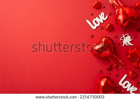 St Valentine's Day concept. Top view photo of heart shaped balloons cupid silhouette inscription love candies and confetti on isolated red background with empty space