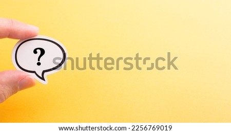 Question mark speech bubble of business concept on yellow background with blank copy space.