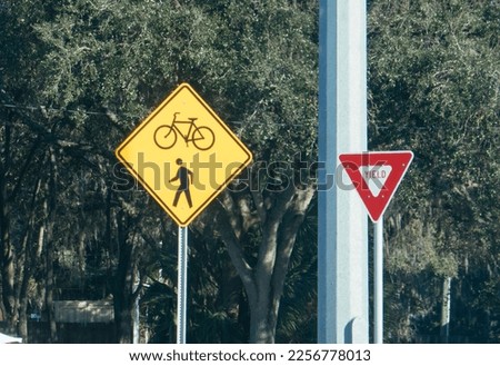 bicycle and walking lane and yield sign