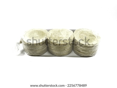 Simping cake is a typical snack of Purwakarta, West Java, made from tapioca flour, wheat plus flavoring seasonings and various flavors of spices and fruits. . This simping is aromatic ginger flavor. Royalty-Free Stock Photo #2256778489