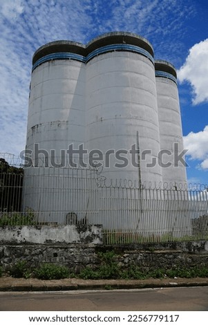 Water reservoir in Manaus with 6 tall water silos built side by side. São Jorge district, Manaus, Amazonas state, Brazil.