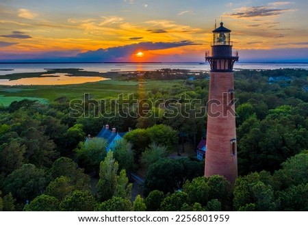 Aerial view of Currituck Beach Lighthouse at sunset near Corolla, North Carolina (Outer Banks) Royalty-Free Stock Photo #2256801959
