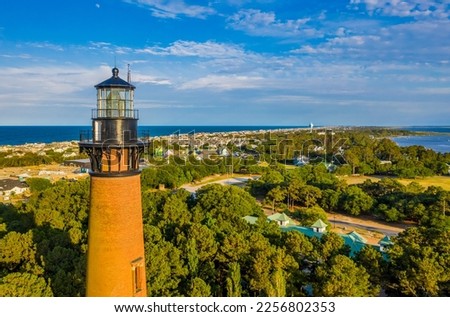 Aerial view of Currituck Beach Lighthouse and surrounding Corolla, North Carolina in the Outer Banks Royalty-Free Stock Photo #2256802353