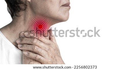 Redness at the neck of Asian man. Concept of sore throat, pharyngitis, laryngitis, esophagitis, thyroiditis, choking or dysphagia. Royalty-Free Stock Photo #2256802373