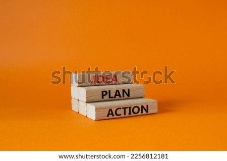 Idea Plan Action symbol. Wooden blocks with words Idea Plan Action. Beautiful orange background. Business and Idea Plan Action concept. Copy space.