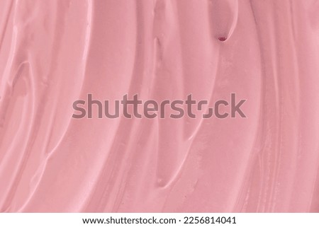 Pink cream or frosting texture close-up Royalty-Free Stock Photo #2256814041