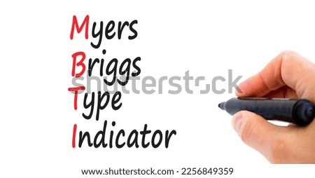 MBTI Myers Briggs type indicator symbol. Concept words MBTI Myers Briggs type indicator on white paper on beautiful white background. Psychological MBTI Myers Briggs type indicator concept. Copy space