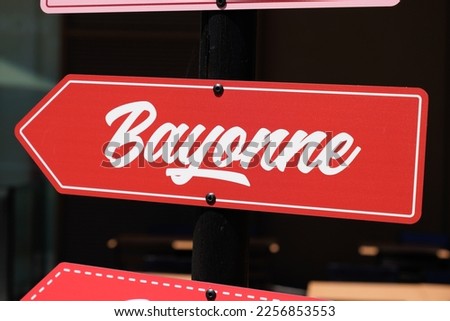 Bayonne logo and text sign arrow red panel of French city in south west pays basque country